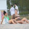 Heavily Pregnant Model Iskra Lawrence Takes A Sunset Dip In Miami Beach 0044