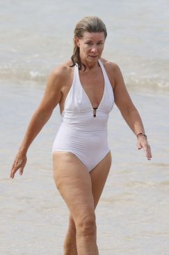 Deborah Hutton Takes a Swim at a Closed Sydney Beach
