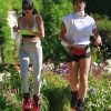Elisabetta Canalis Hops Around Town With A Friend On Kangoo Jumps 0027