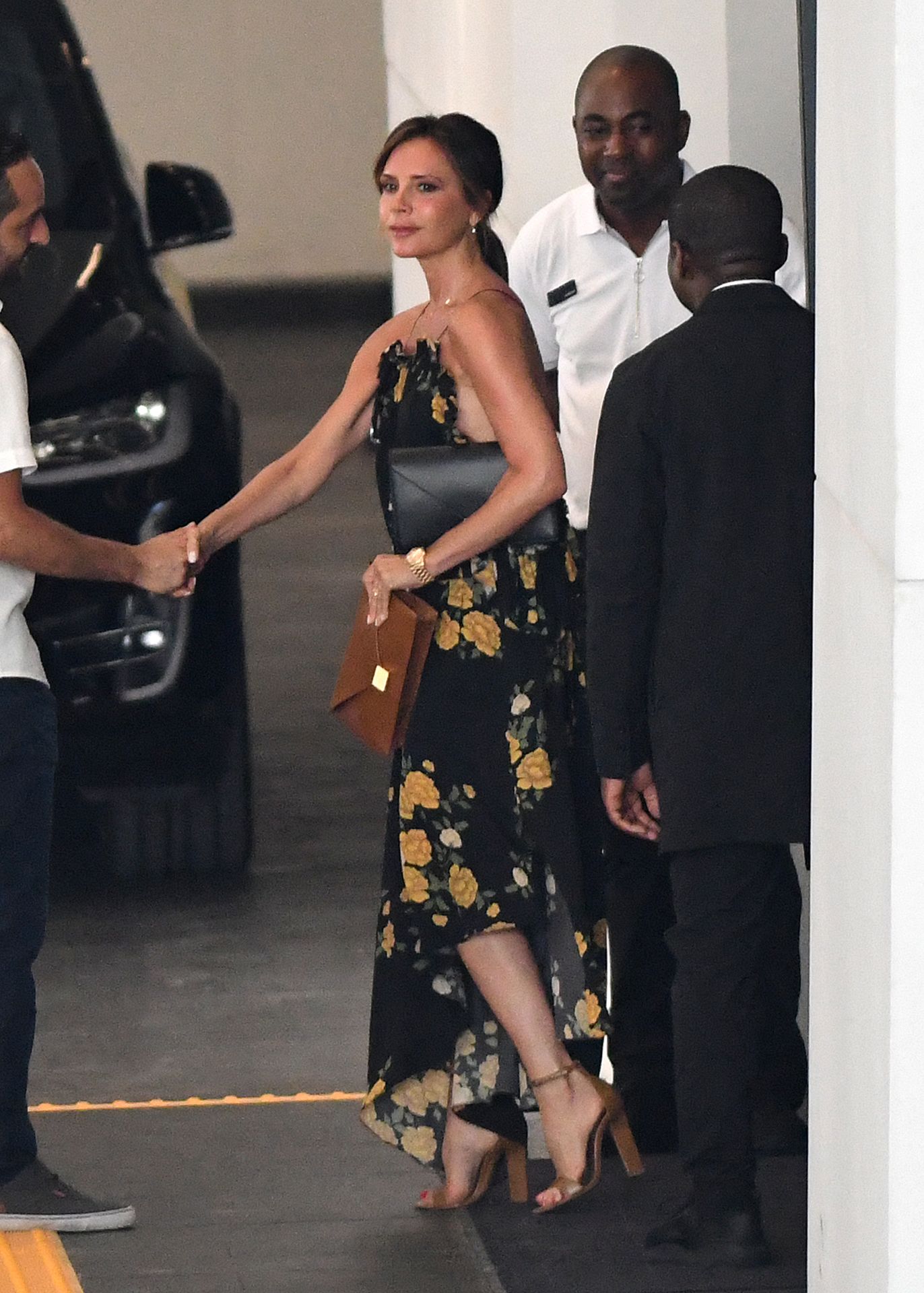 Victoria Beckham Wears A Backless Dress As She Goes Luxury Apartment Hunting In Miami 0009