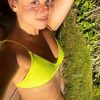 Kira Kosarin – Sexy Toned Body In Skimpy Yellow Bikini 0002