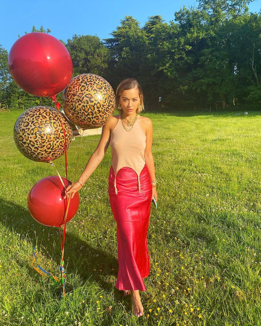 Rita Ora – Sexy Boobs In Braless Photoshoot At Balloon Party 0002